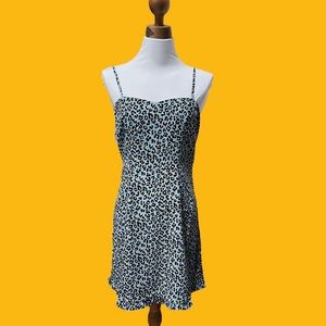 Sugar Lips Blue Leopard Print Ruffle Hem Strappy Mini Dress
